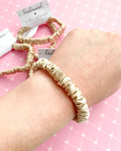 Load image into Gallery viewer, Silk Skinny Scrunchie: Fix Your Ponytail And Turn The Page (champagne)
