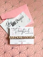 Load image into Gallery viewer, Silk Skinny Scrunchie: Fix Your Ponytail And Turn The Page (champagne)

